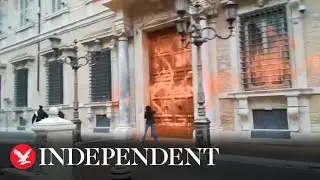 Activists spray orange paint on Italian Senate to protest against climate change &lsquo;inaction&rsquo;