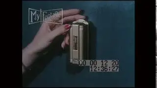 1950s Hands Adjust Thermostat