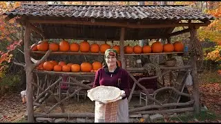 Cooking Pumpkin Qutab Over a Campfire in the Autumn Forest