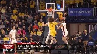 Tre White leads Illinois to a 93-73 rout of #15 Michigan