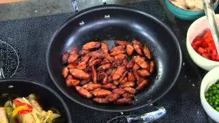 Emeril's (3) 16 oz. Choice of Andouille or ItalianSausages with Carolyn Gracie