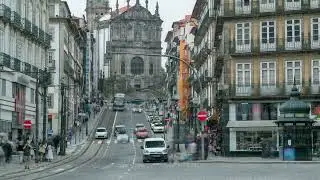 Clerigos Church with trarric on road timelapse