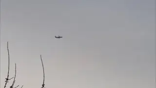 DHL Boeing 763ER [A9C-DHT] flying above at evening