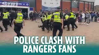 Police and Rangers fans clash outside Hampden