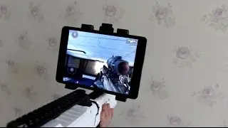 Universal controller for games in the genre of FPS