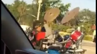 Guy On Motorcycle With Drums Plays Michael Jackson Beat It At Red Light