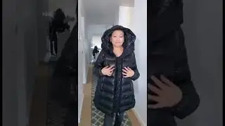 Black long down puffy coat with a hood. Moncler long down jacket.  Длинный пуховик Moncler.