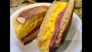 UNEDITED CHEESY EGGS BEEF BOLOGNA ENGLISH MUFFIN HAMILTON BEACH SANDWICH MAKER
