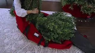 Loading a Tree into a Santas Bags EZ Roller Tree Duffel