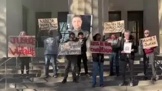 Family, activists rally at deputy&rsquo;s first court appearance on murder charges