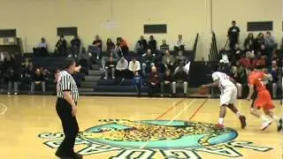 Elijah Cain finish in the paint against Middle