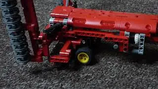 Lego folding harrow wheel retraction.