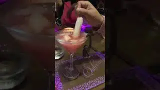 Birthday Barton G champagne popsicle in martini cocktail