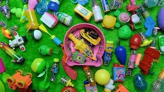 Asmr color balls and various candy container characters, there are jet sky, sword and others