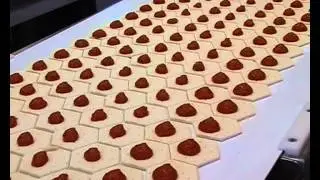 Polin pastry line from Brook Food making Hexaganol pizza with auto panning - Bakery Equipment