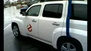 The Ghostbusters of Salt Lake car parked outside of the UtahFM studios