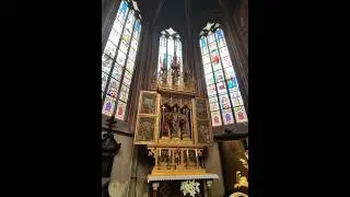 @BlazingBaldie steps inside St. Vitus Cathedral&mdash;so massive, it humbles the echo of your own breath.