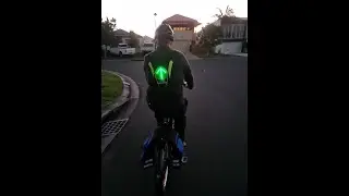 Riding my Bike with my Redaffects Safety Vest