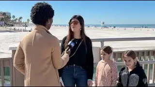 Tourists embrace Florida's chilly weather while locals bundle up