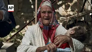 Ukraine dam flood rescue efforts by Russia