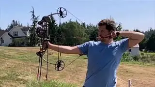 Shooting a hunting bow in slow motion.