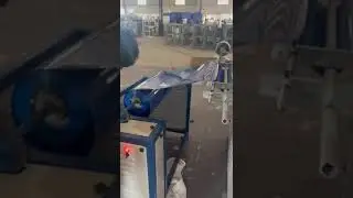 AUTOMATIC VACUUM FORMING MACHINE WITH SHEAR CUTTER