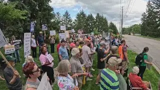 Hoosiers protest federal immigration policies outside Sen. Todd Young's office in Carmel
