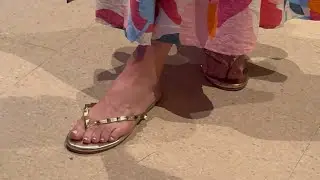 Pretty mom candid feet in flip flops