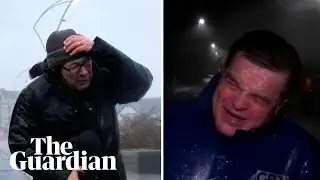 News reporters blown around by heavy winds during Storm &Eacute;owyn