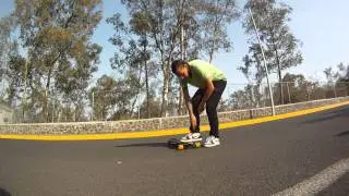 Longboarding: Trick tip: Cross legged slide shove it