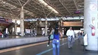 Train Station in Brazil - Brazilian commuters walk around