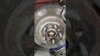 If you have this screw in your brake rotor with the bolt type lug just delete this screw!!