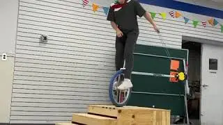 Boy Does Skipping While Riding Unicycle on Wooden Ramp - 1123720-2