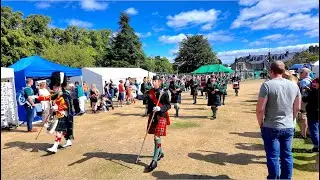 Drum Majors lead the Gordon Highlanders Drums & Pipes march into 2025 Aboyne Highland Games Scotland