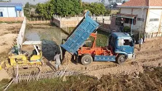 Start New Project, Unloading Soil to Flooded land with Bulldozer D2 Pushing soil.