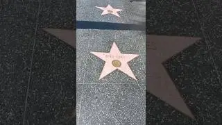 YungBart walks the Hollywood Walk of Fame in Hollywood, California