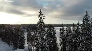 Snowy frozen lake - Winter in Finland - Aerial Film