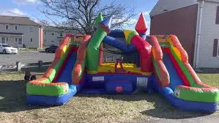 Dual lane rainbow bounce house unboxing set up
