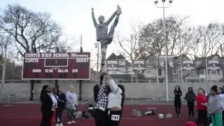 Watch the Curtis High School cheerleaders in action