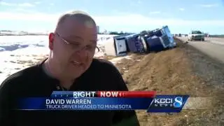 60 mph gusts blowing over semis in Iowa