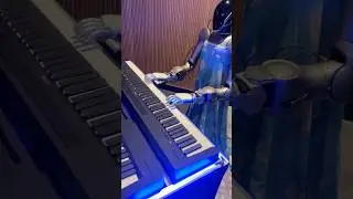 Robots in Traditional Chinese Attire Play Electronic Piano #robotics #future