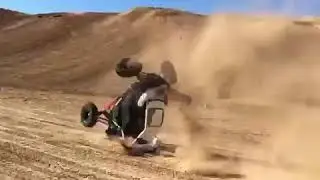 Dune Buggy Tumbles Amidst Sand - 1088678