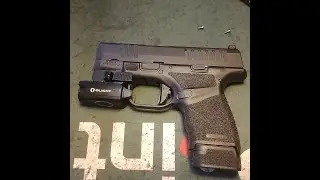 SpringField Hellcat 9mm With Olight Pl mini 2 Valkyrie.