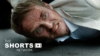 A father must pick up his young son in a building under police surveillance. | Short Film 
