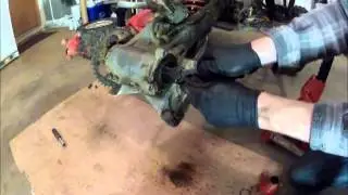 400ex rear axle bearing carrier removal