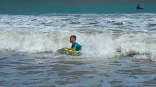 Bodyboarding in small but fun waves