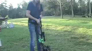 Adam and Shelene demonstrates drawing bow with cranking device