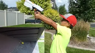 SHOOTING A WASP NEST WITH A NERF GUN!!