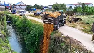 Bulldozer pushing Except Safety Full Dirt Rock With Loader Dump Truck loading