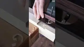 Carving evenly spaced grooves into wood with precision hand tool